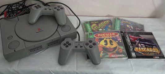PlayStation 1 Console + 2 Controllers + 4 Games